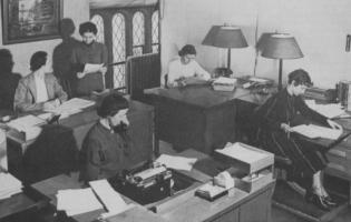 Photo of five women working in the Industrial Relations Section. (February 3, 1938)
