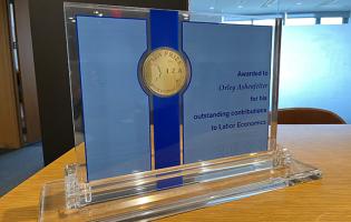 IZA award in a clear lucite frame reads,”Awarded to Orley Ashenfelter for his outstanding contributions to Labor Economics